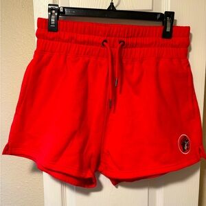 Bucee’s red track shorts- size M